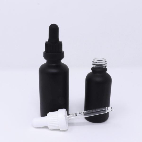 Black frosted glass bottle